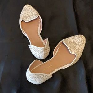 White & beige flats